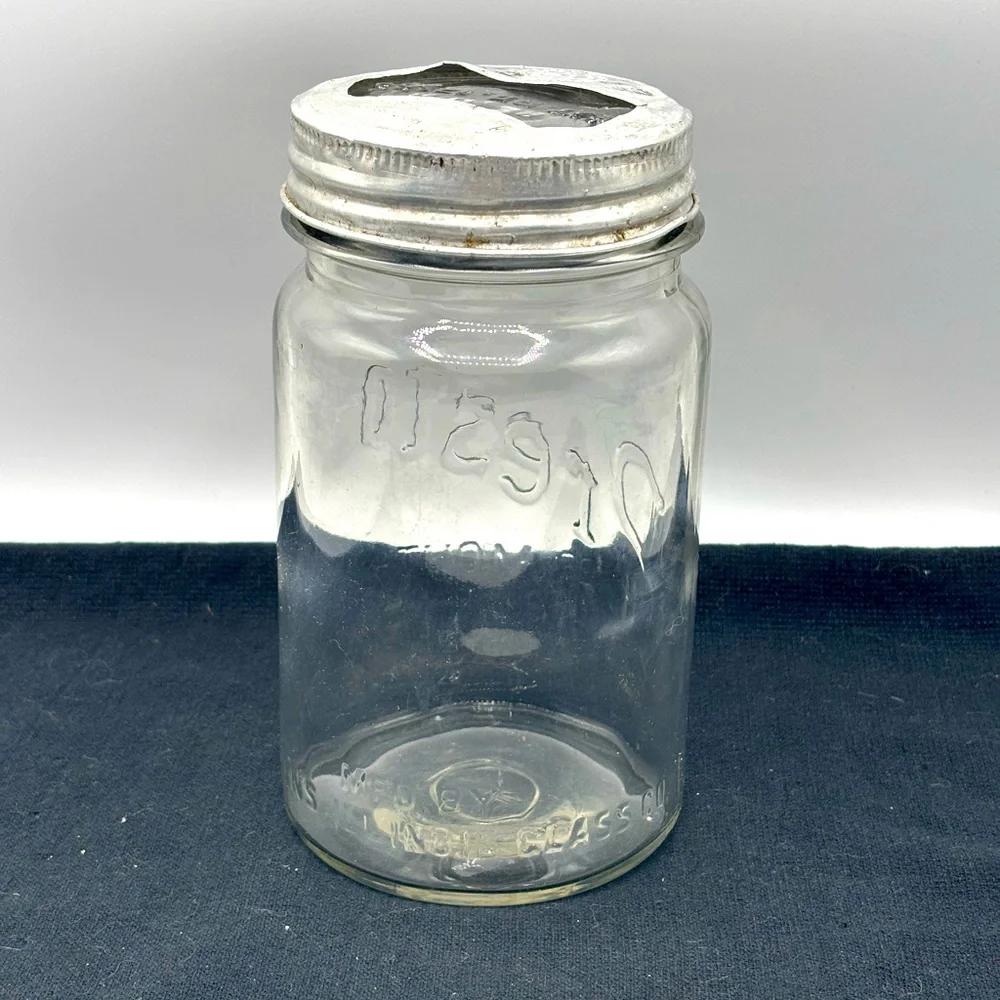 VTG. Rare Presto wide mouth cylindrical shape qt. Jar with glass bow tie lid.